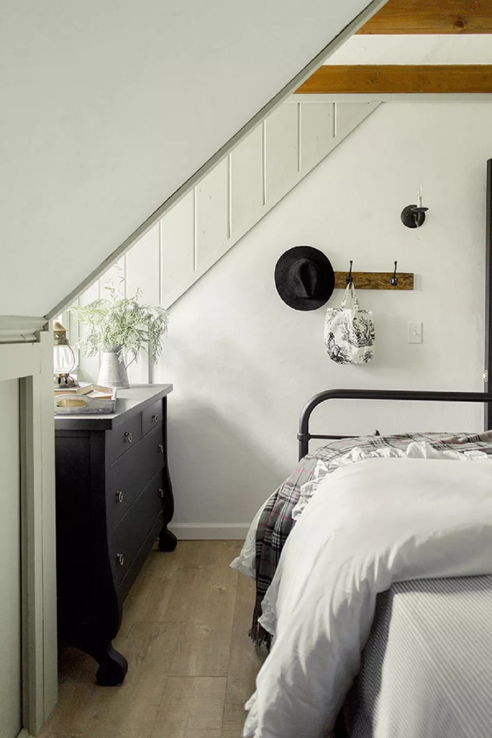 Farmhouse Style Bedroom With Typical Attic