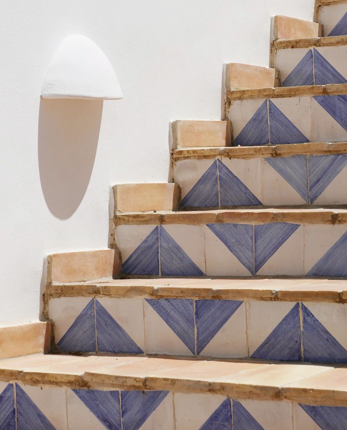 14 Colorful Tile Riser Styles That Will Add Fun to Any Staircase! - 7. Vintage-Inspired Tiles 1