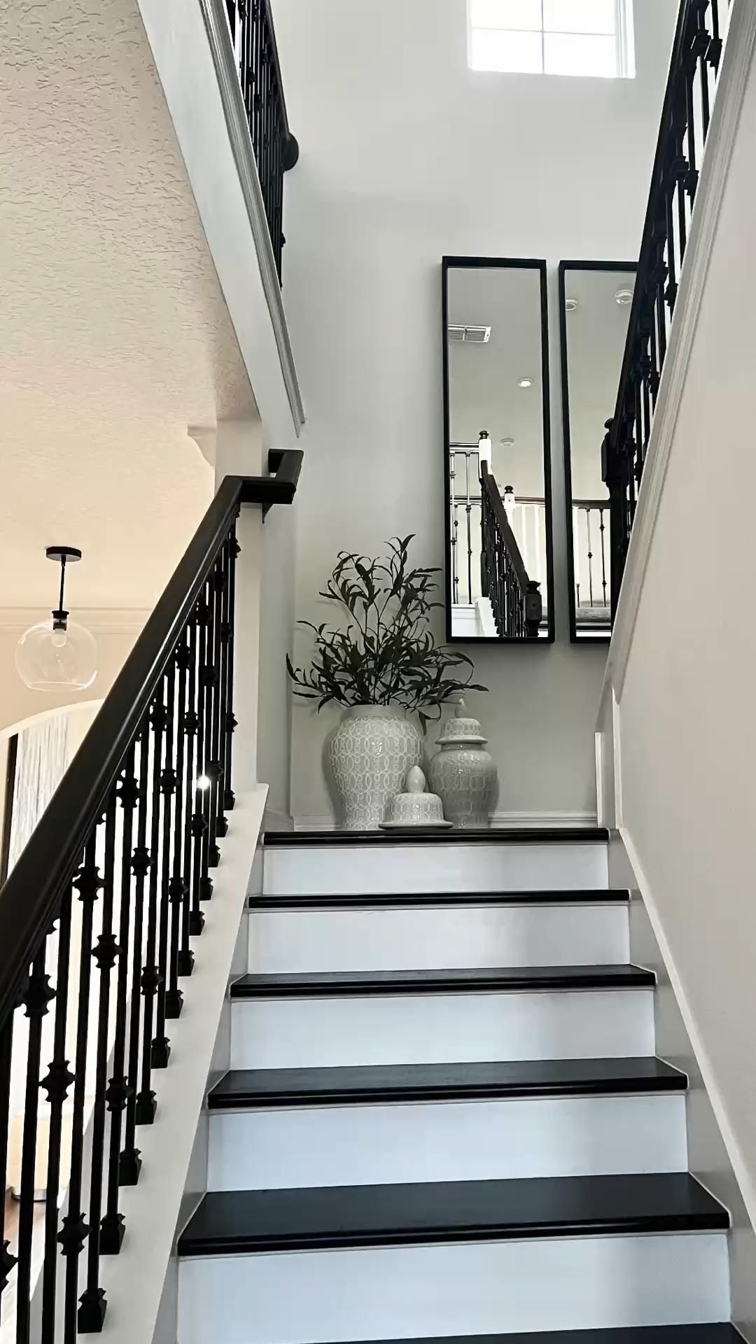 20 Aesthetic Staircase Wall Decor Ideas That Will Transform Your Home (You’ll Love #15!) - 6. Mirrors to Open Up Space 1