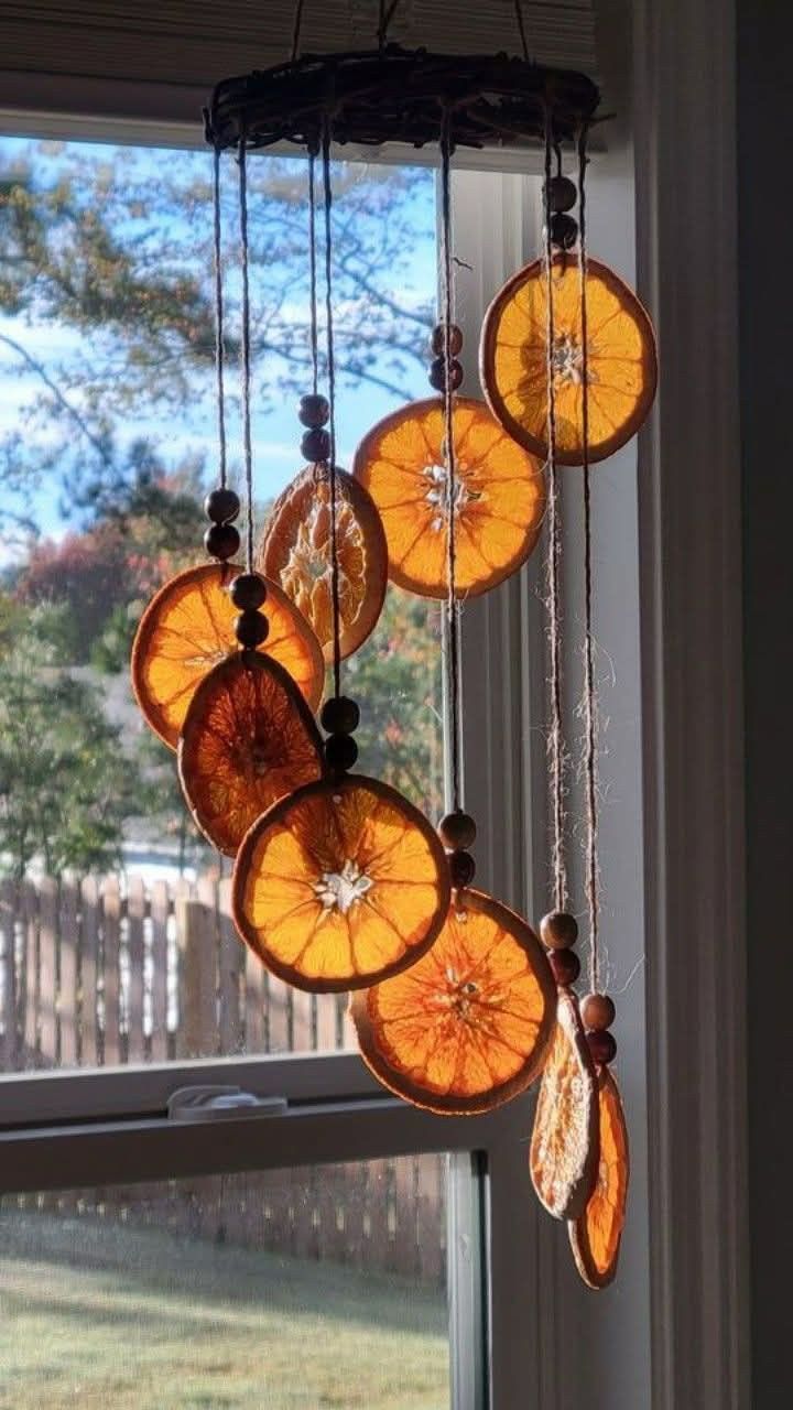20 Affordable Fall Porch Decor Hacks You Can Make This Weekend! - 14. Fall-Themed Wind Chimes 1